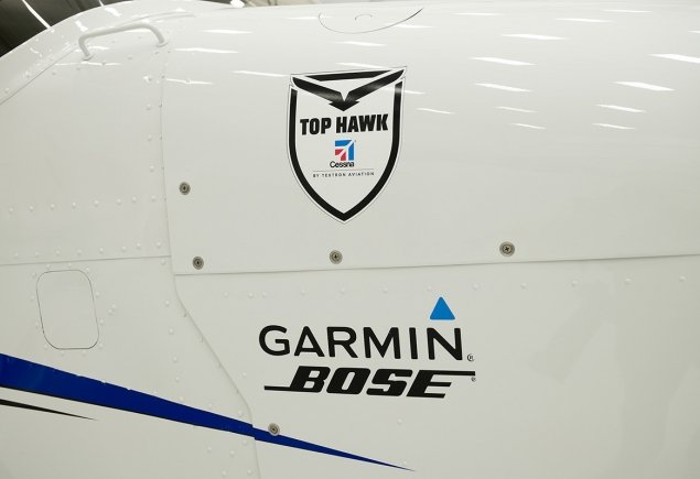 side of plane with logos on it