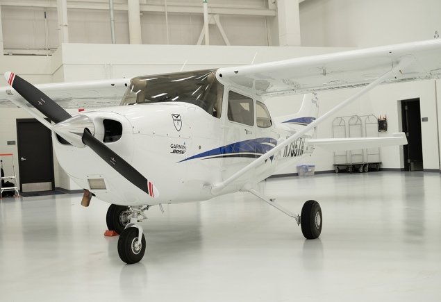 white and blue front panel of plane